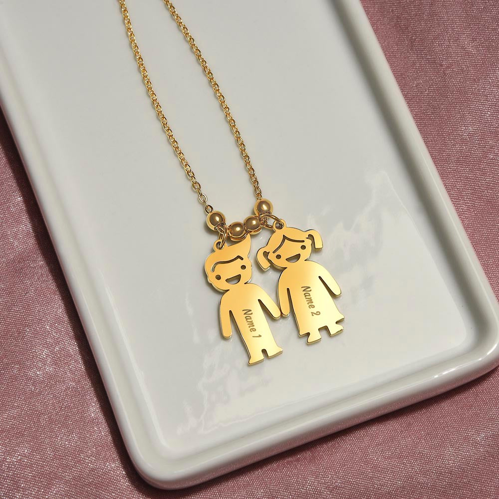Close-up showing engraved custom name on necklace pendant