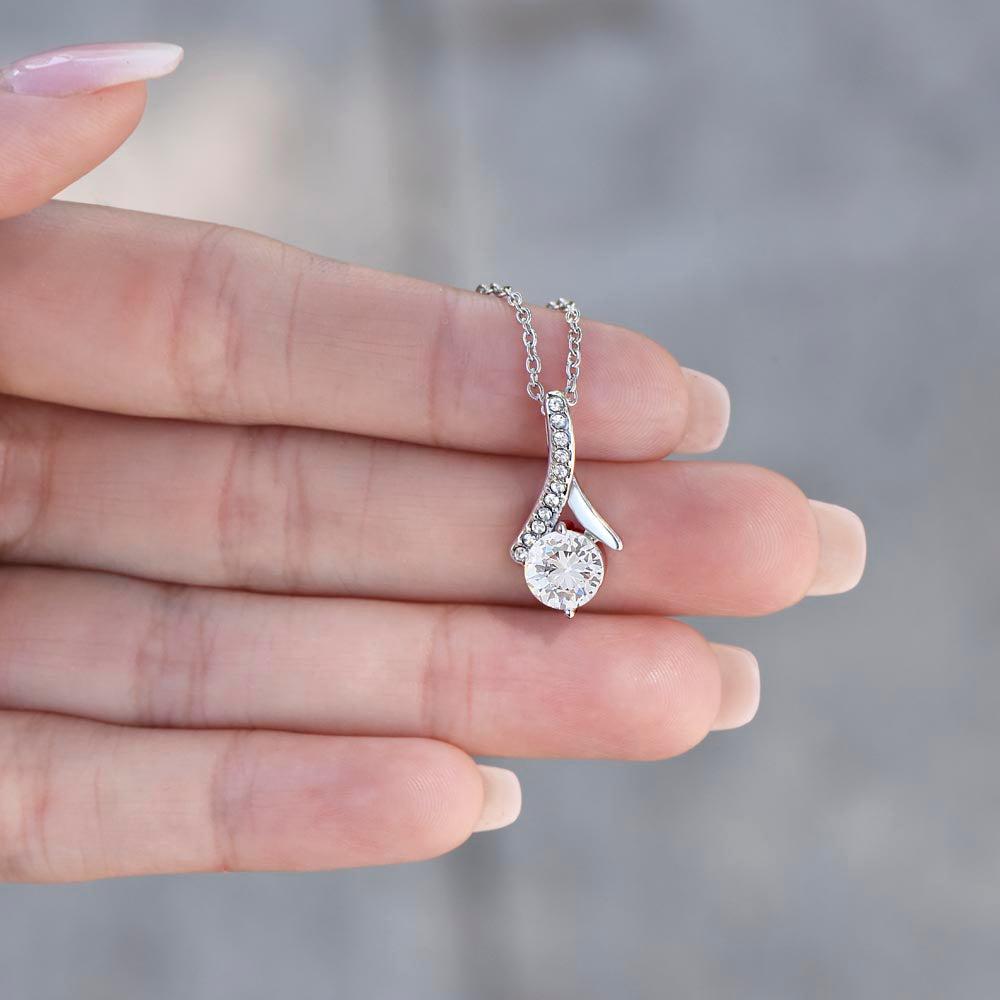 Model wearing romantic couple necklace in lifestyle setting