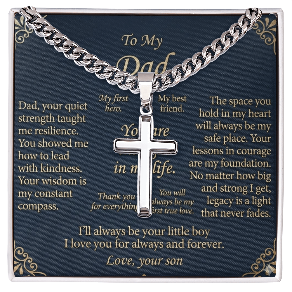 Close-up front view of artisan cross necklace with Cuban link chain