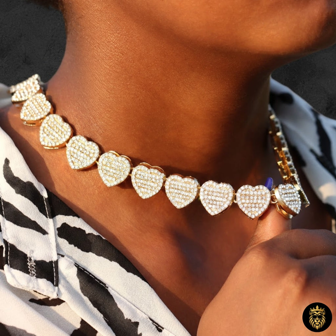 Close-up of diamond-studded crushed heart pendant shining under light
