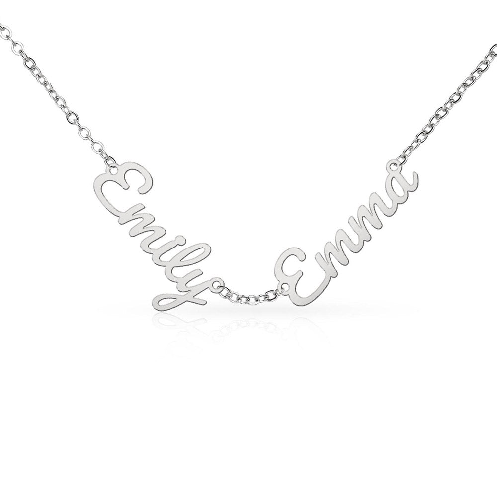 Close-up view of engraved multiple names on personalized family necklace pendant