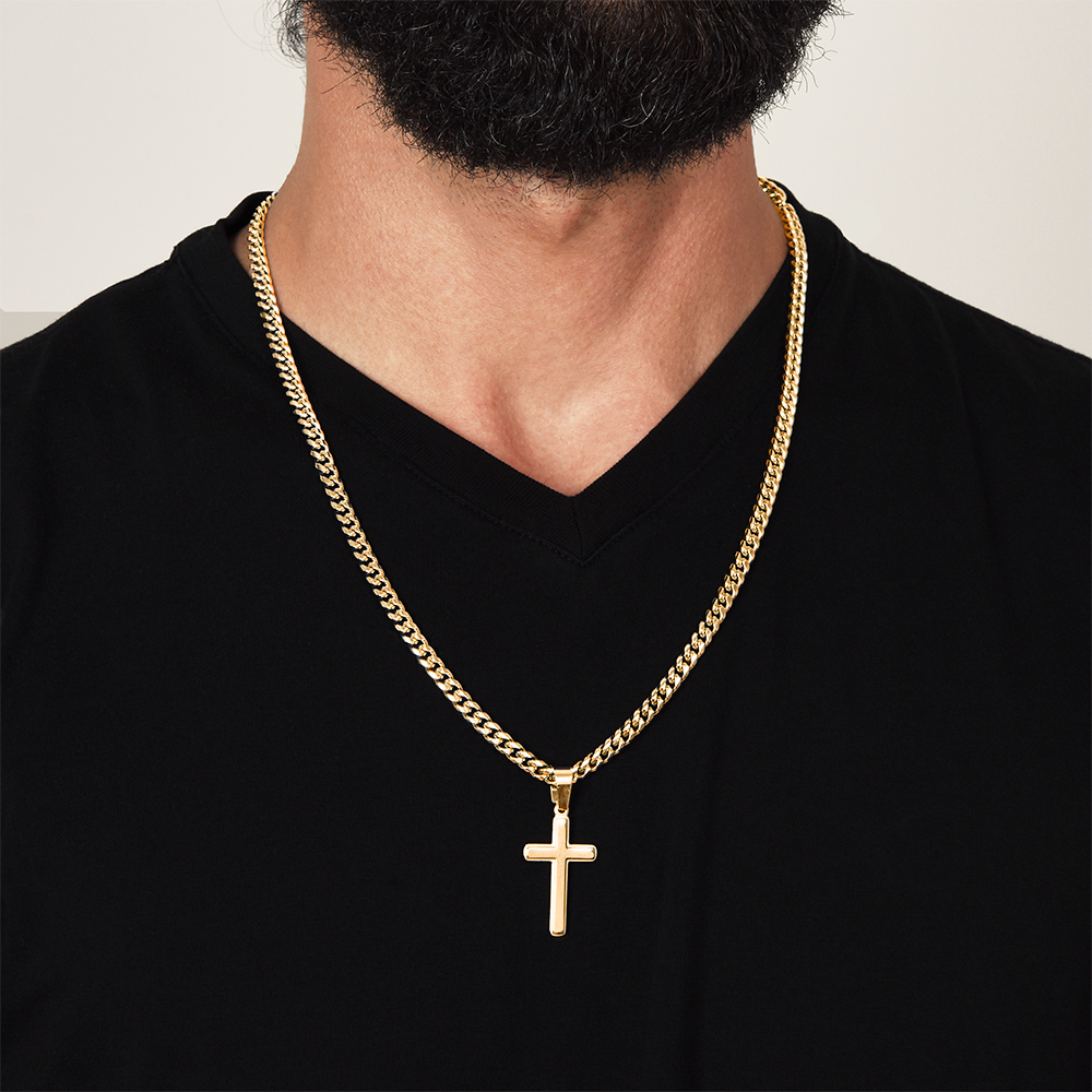 Cross necklace displayed on minimal background