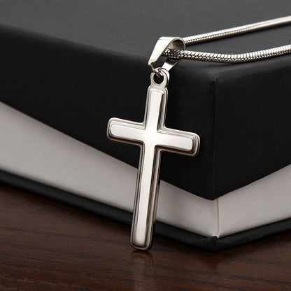 Side angle view of artisan cross pendant highlighting thickness and detail