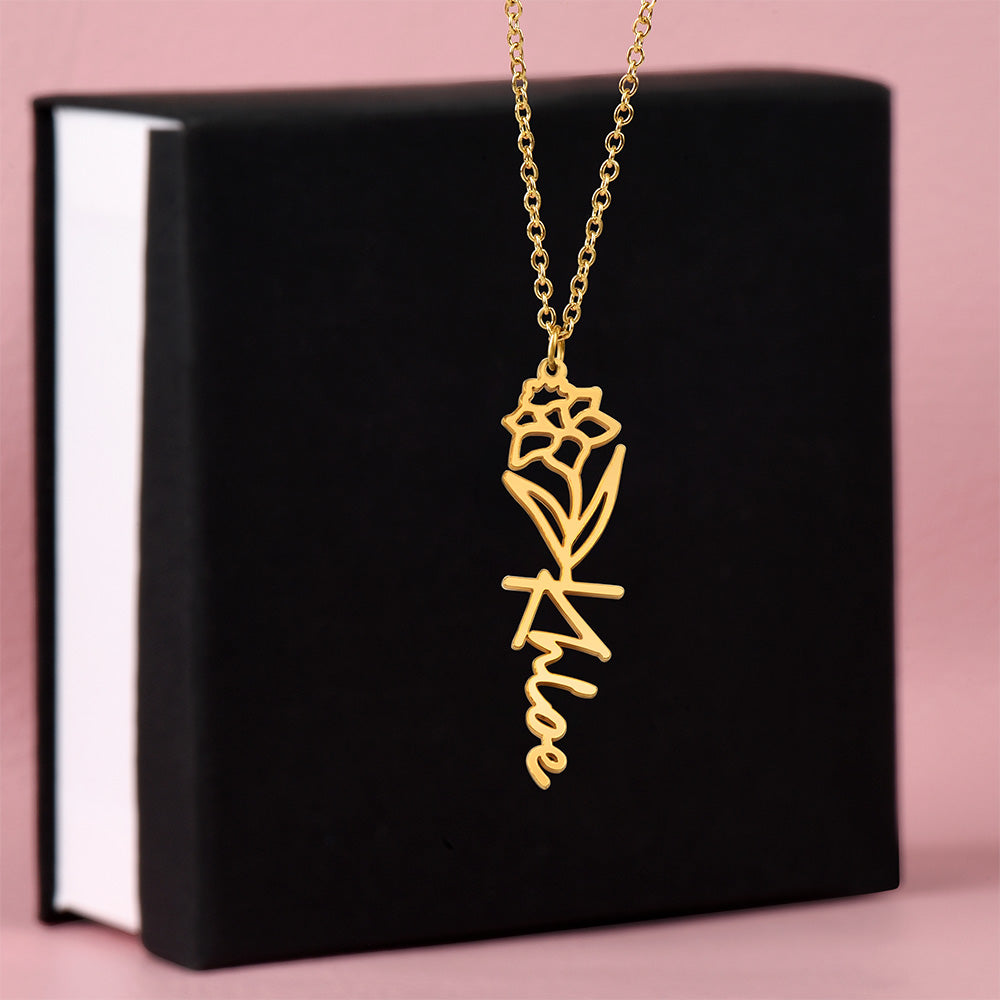 Close-up of personalized flower style name necklace with detailed engraving