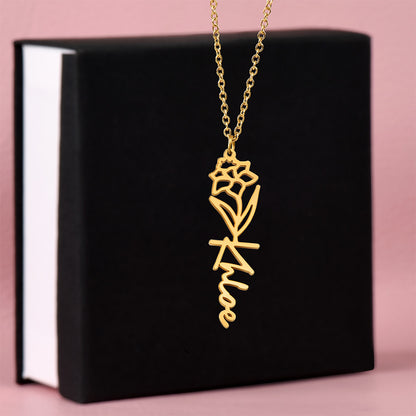 Close-up of personalized flower style name necklace with detailed engraving