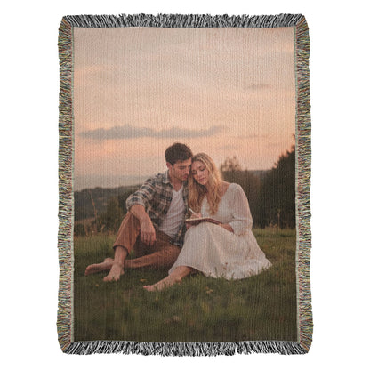 Personalized woven blanket featuring a custom family portrait.