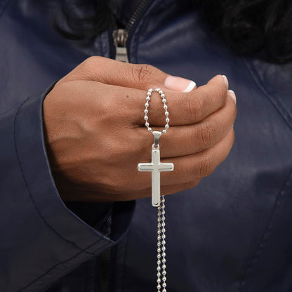 Durable stainless steel cross pendant close-up detail