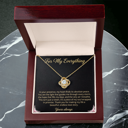 Love Knot necklace displayed in luxury box