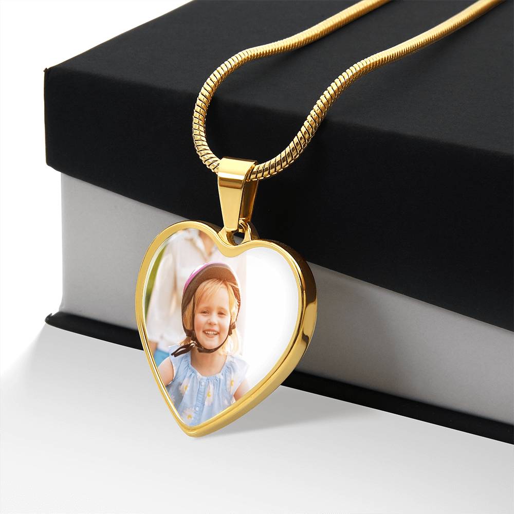 Macro view of engraved heart necklace surface text