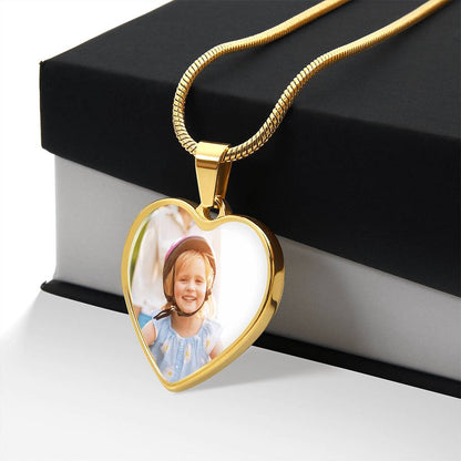 Macro view of engraved heart necklace surface text