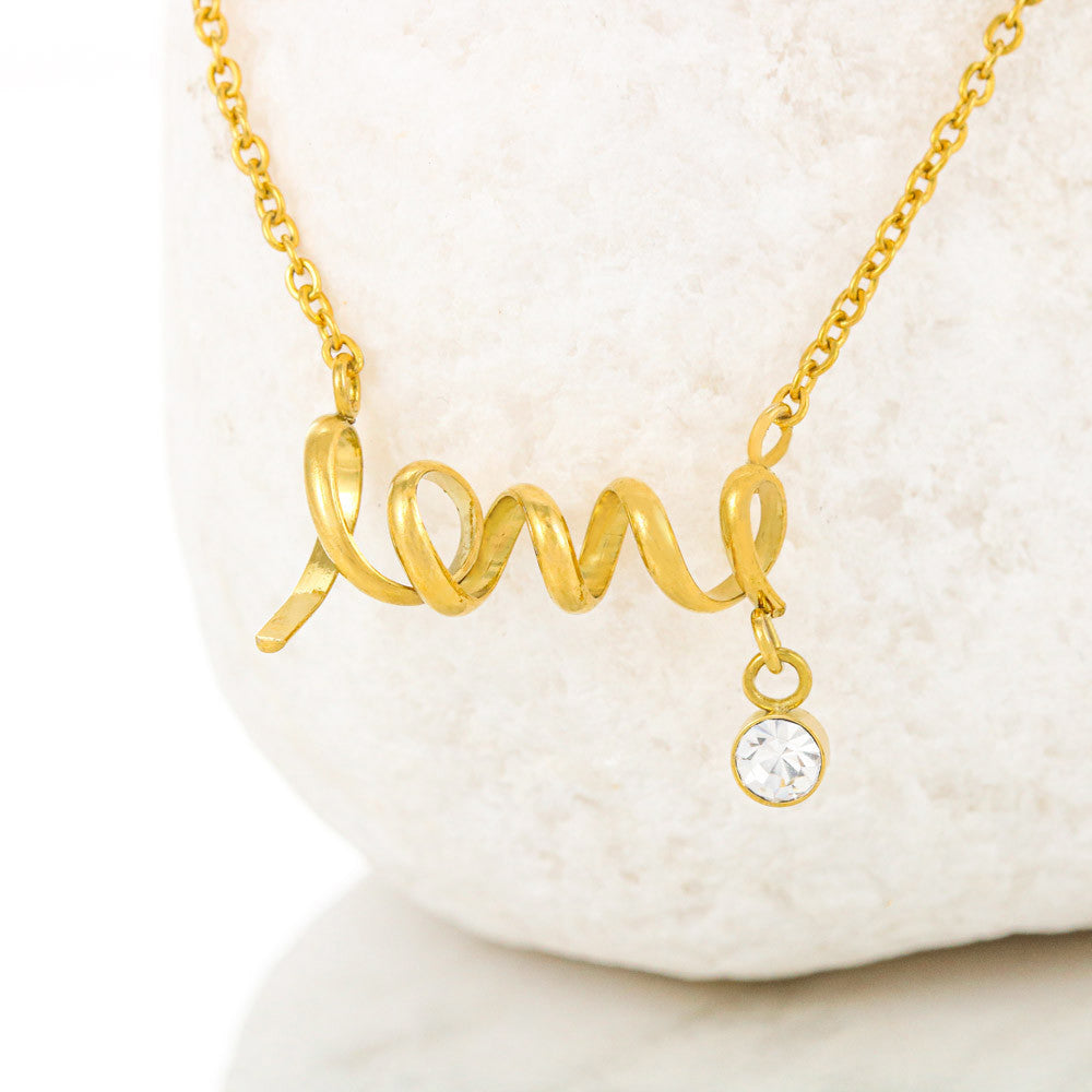 Scripted love pendant hanging from premium chain