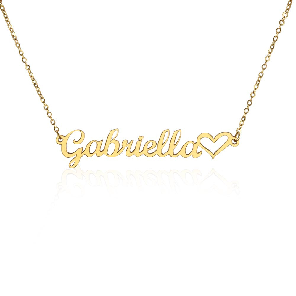 Gold plated personalized name necklace displayed on jewelry stand