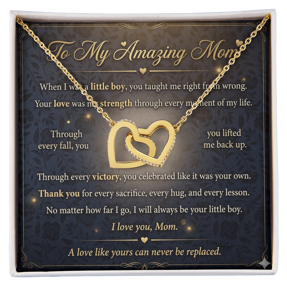 Mother wearing gold interlocking hearts necklace in natural lighting