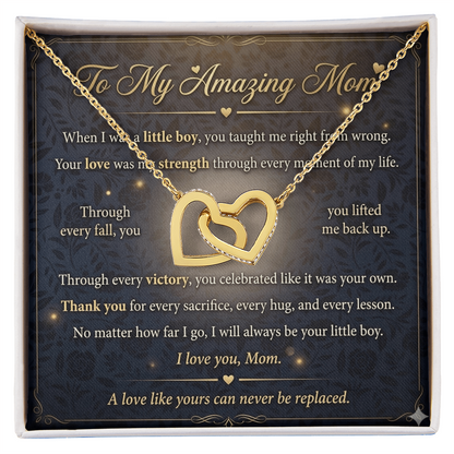 Mother wearing gold interlocking hearts necklace in natural lighting