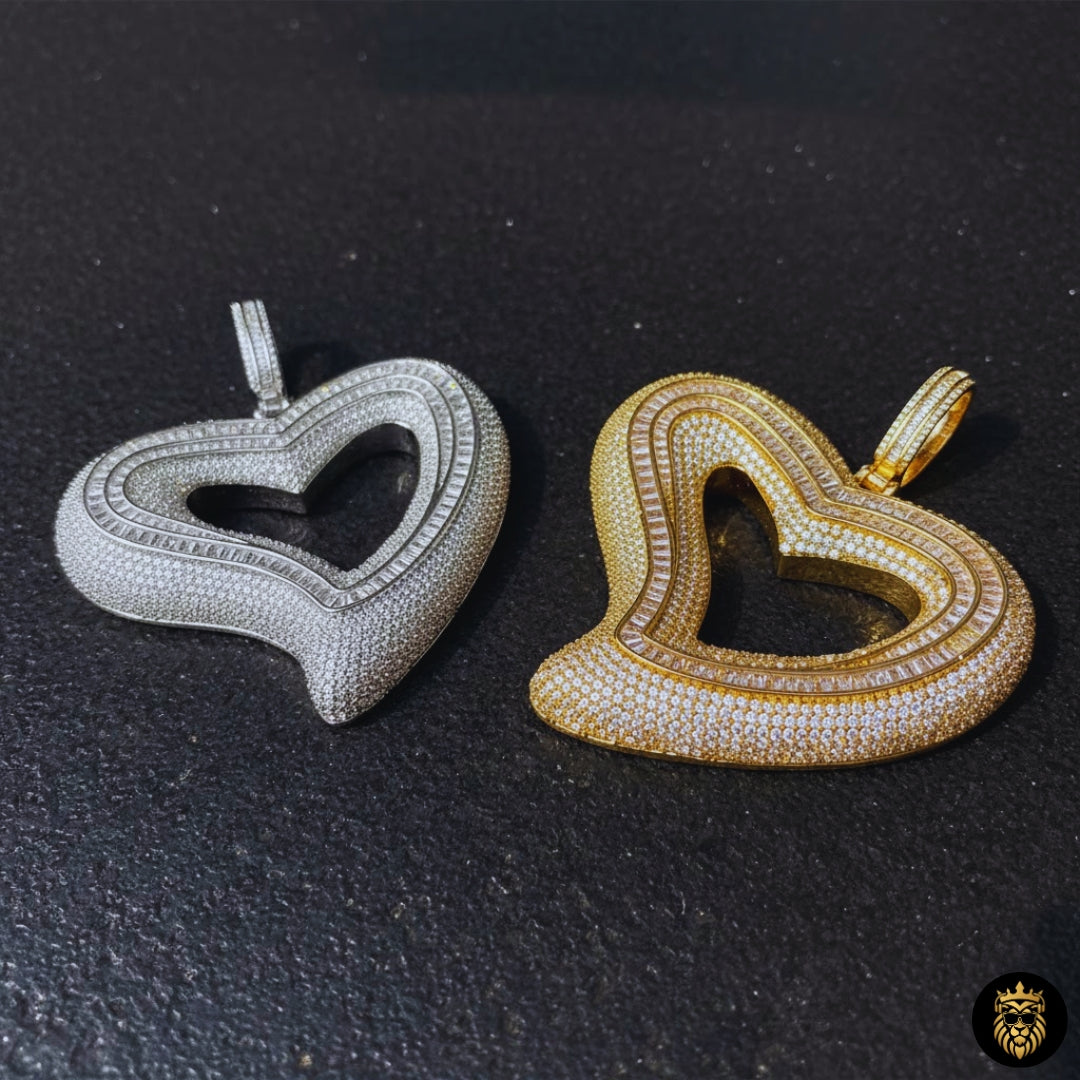 Close-up of gold plated heart pendant necklace with diamond-style baguette shine
