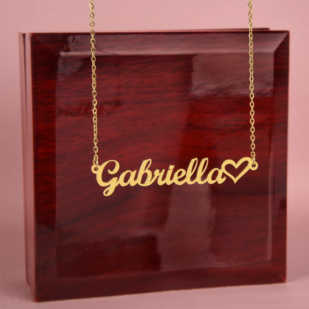 Detailed view of engraved heart pendant custom name jewelry