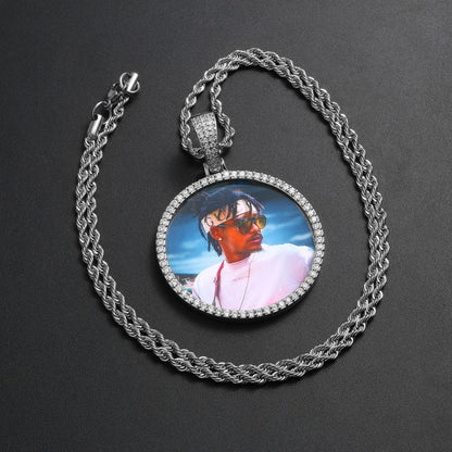 Close up of iced out medallion necklace with customizable photo insert