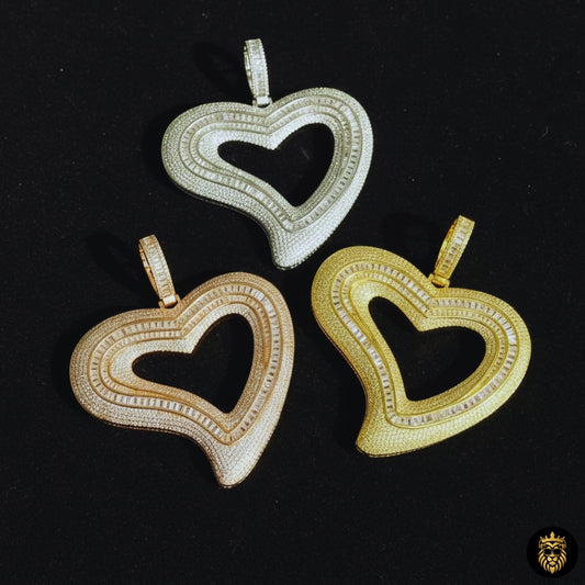 Gold iced out heart pendant necklace with baguette CZ stones in prong setting design

