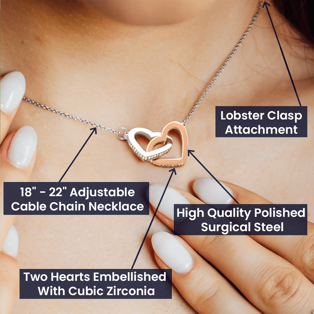 Detailed view of interlocking heart pendant craftsmanship and shine