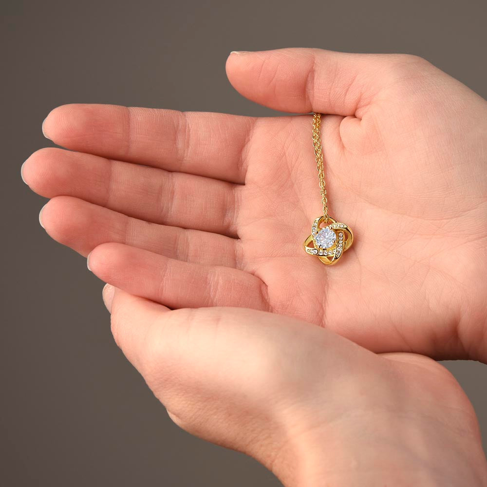 Love knot necklace displayed inside luxury LED gift box