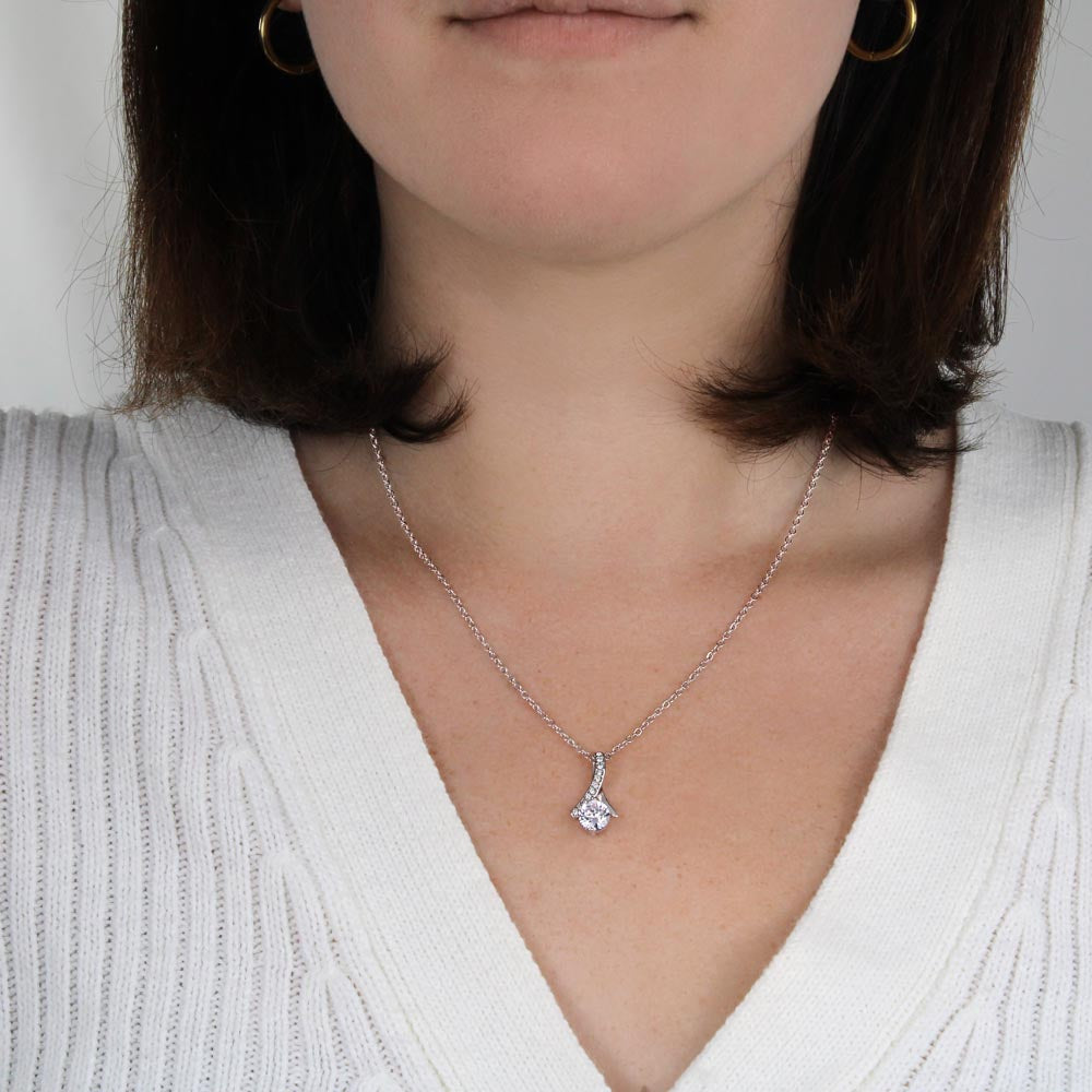 Premium couple necklace displayed in elegant lighting