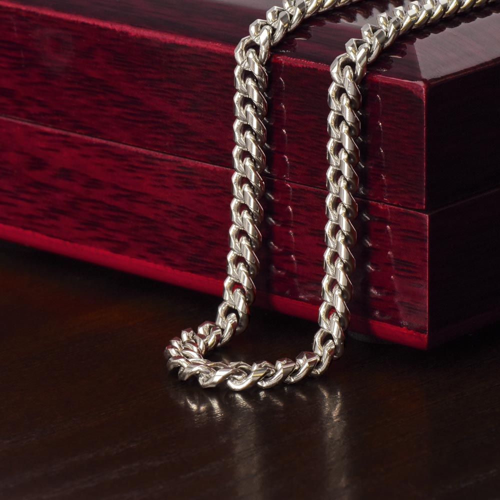 Stylish man wearing Cuban link chain necklace as everyday fashion accessory