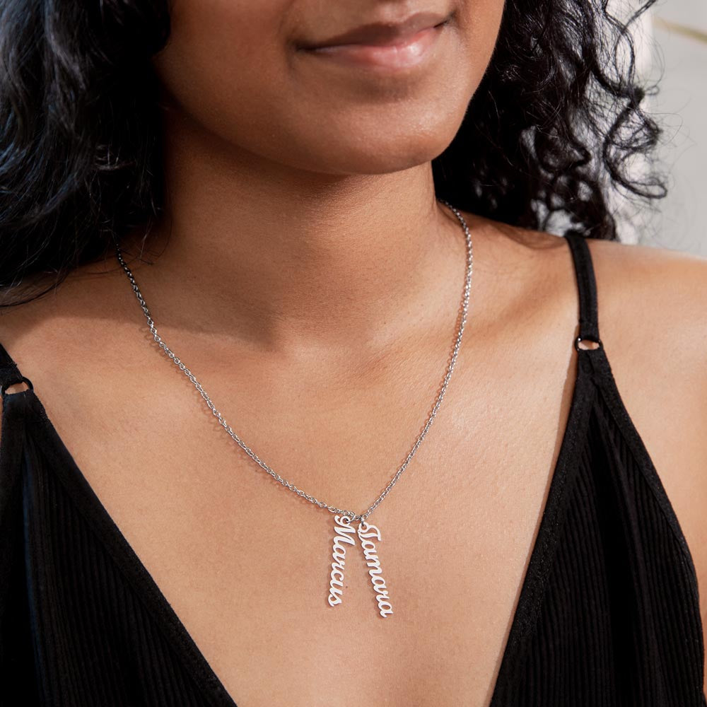 Close shot of multi-name vertical pendant necklace design