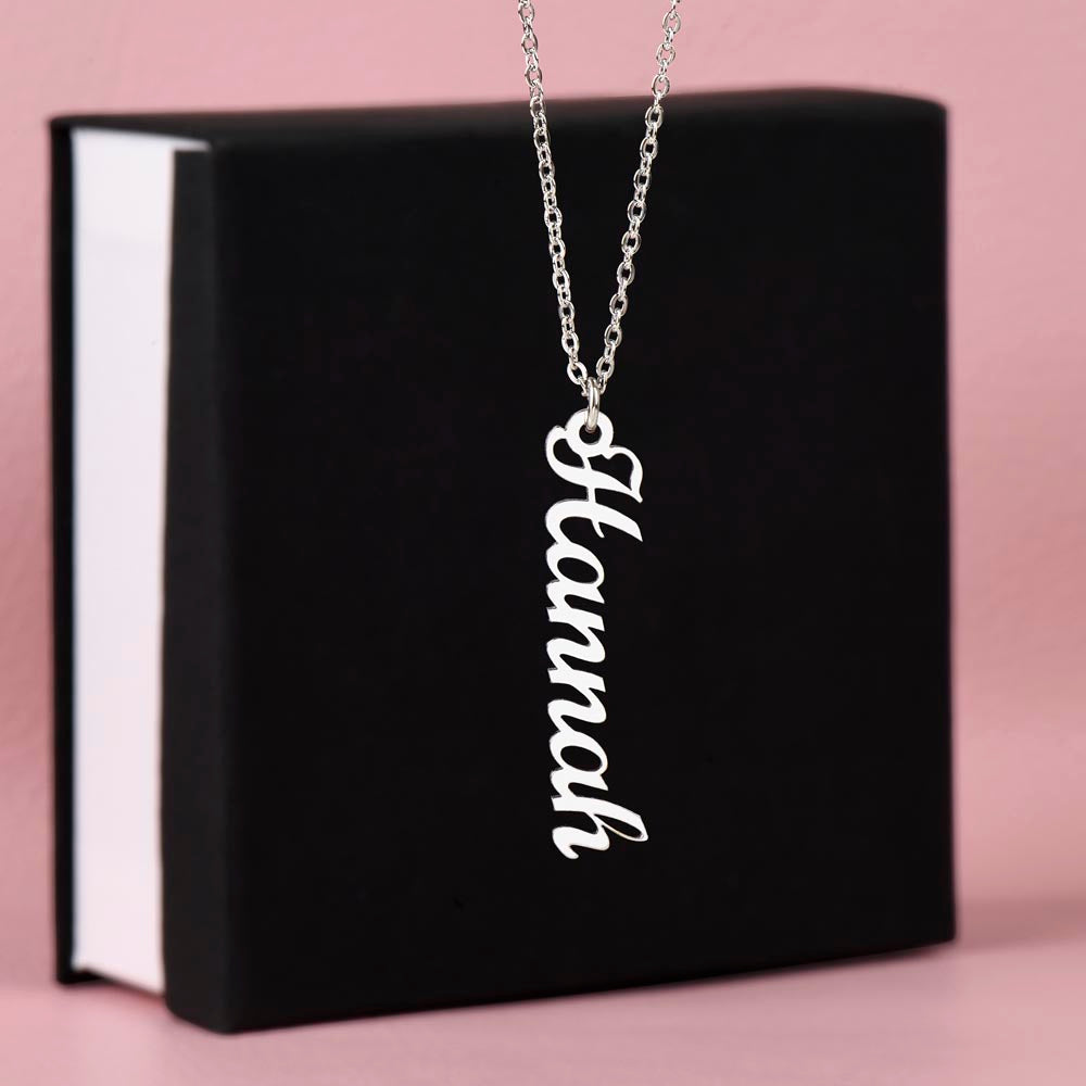 Close-up of multi-vertical name necklace with elegant font engraving