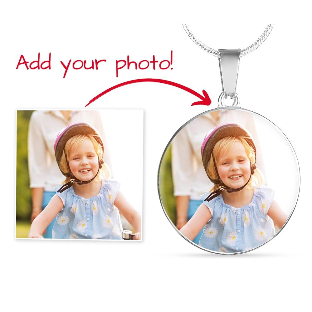Close-up of personalized engraved circle necklace for children