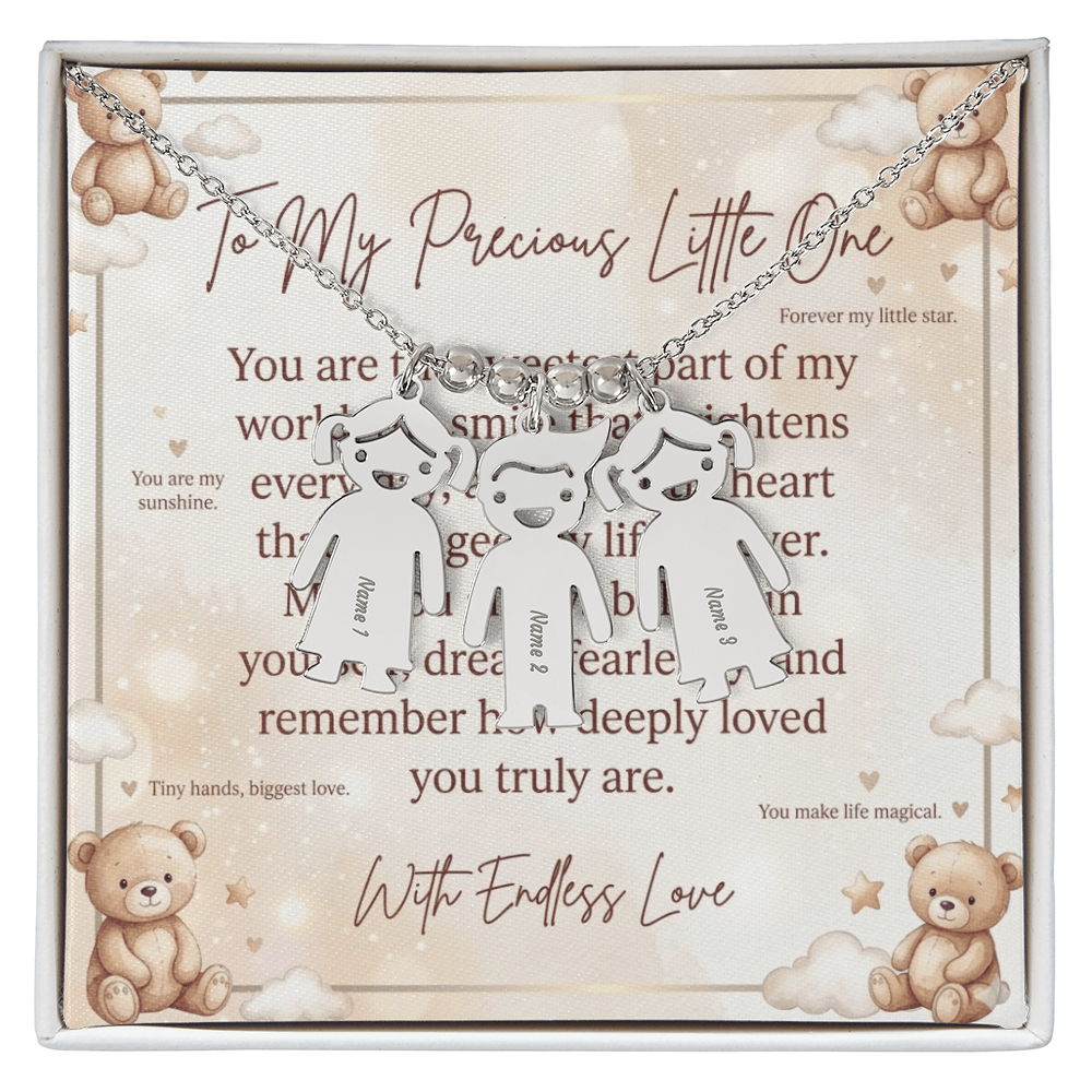 Detailed close-up of engraved name on kid charm necklace