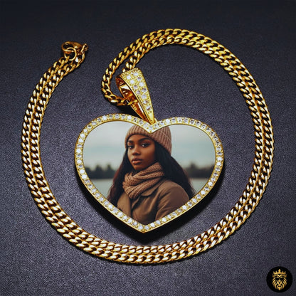 Iced out heart-shaped pendant worn by model with chain
