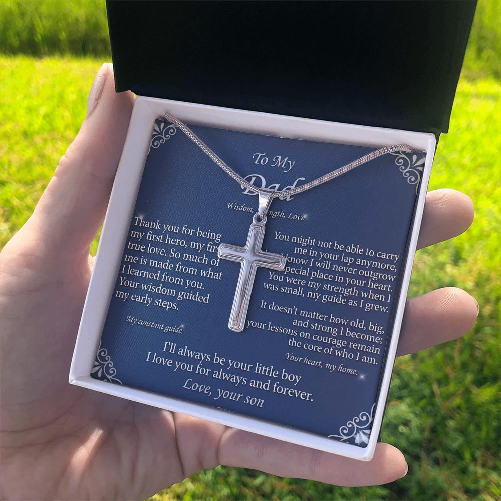 Shiny polished cross pendant reflecting light with premium finish
