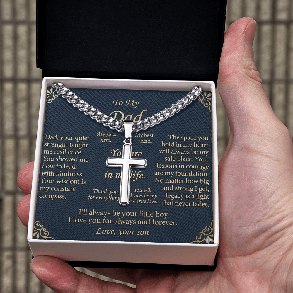 Side angle view of artisan cross necklace for men