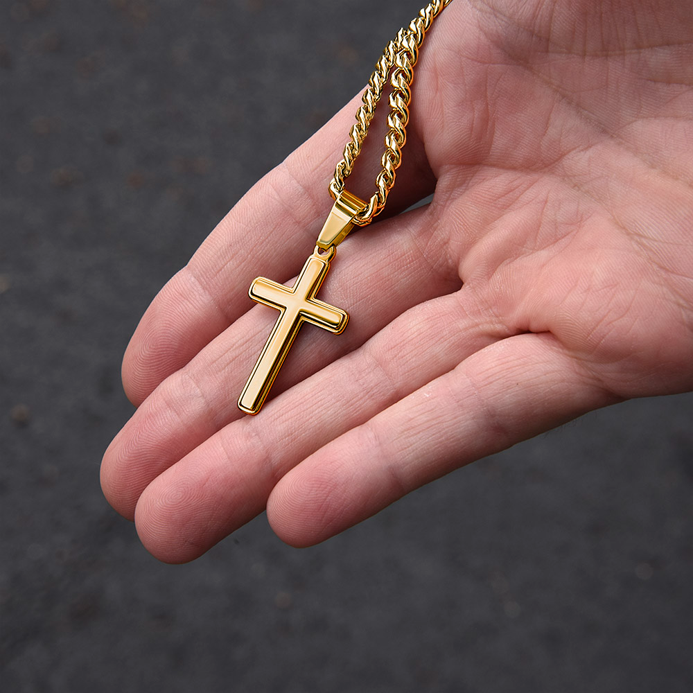 Studio shot of artisan men’s cross necklace