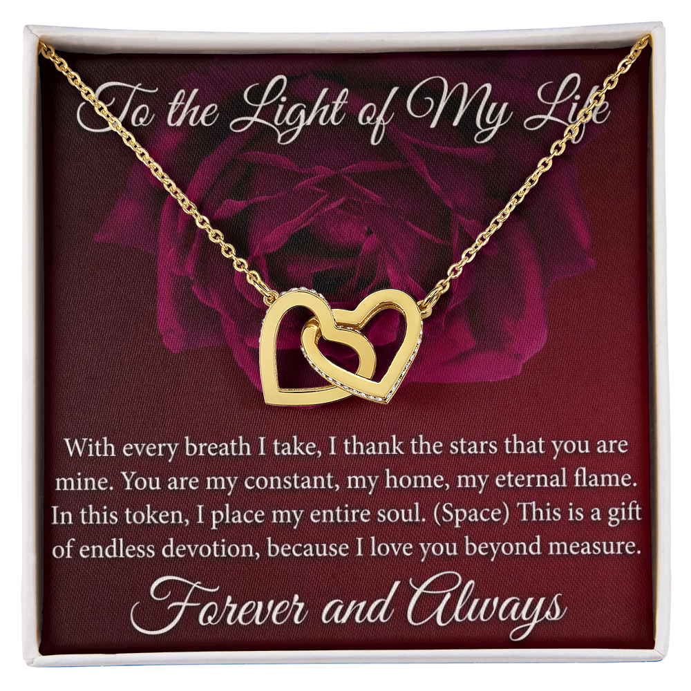 Romantic interlocking hearts necklace with sparkling stones