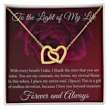 Romantic interlocking hearts necklace with sparkling stones