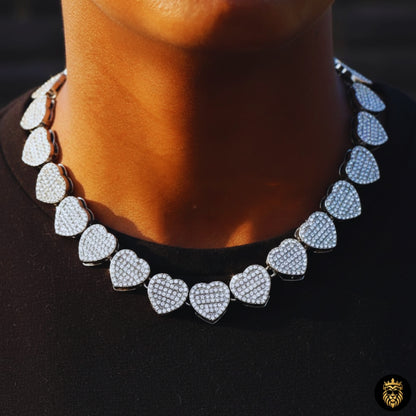 Side angle view of hip hop crushed heart pendant jewelry