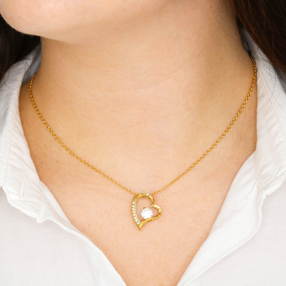 Gold finish Forever Love necklace close-up view