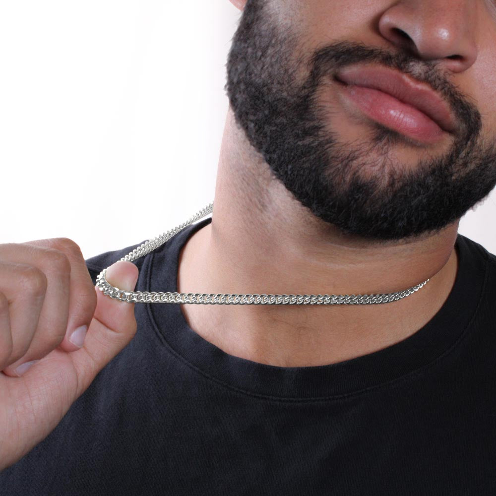Close-up of polished Cuban link necklace
