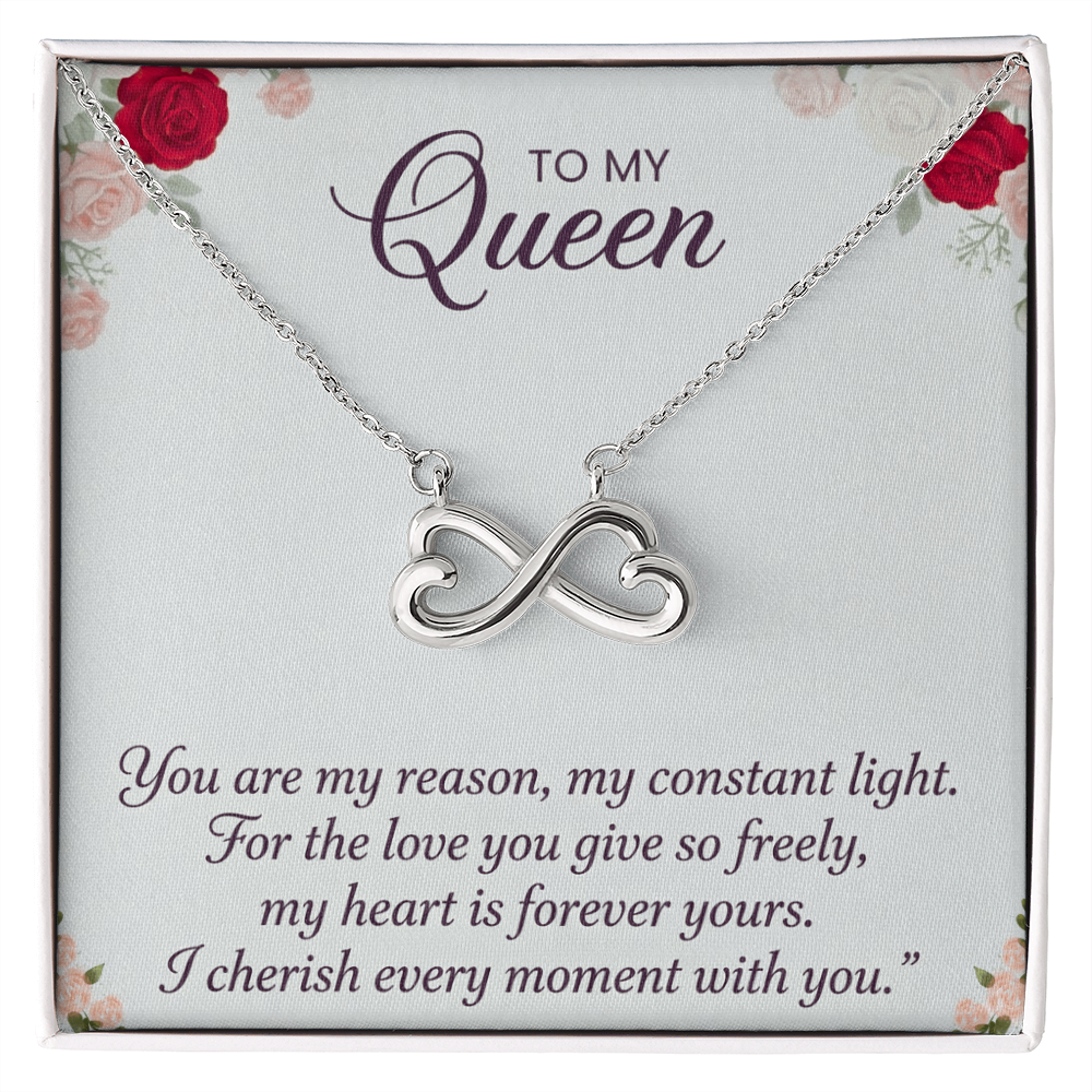 Romantic necklace gift for wife featuring elegant intertwined hearts